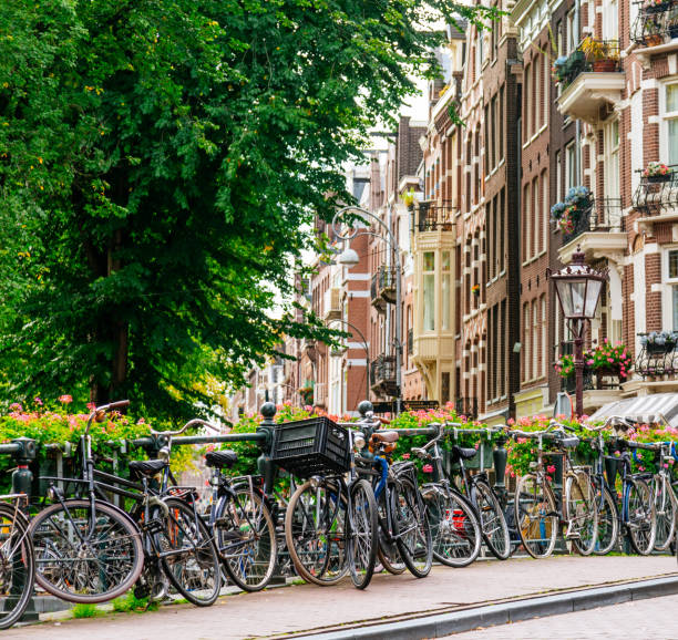 istock Bridge over an Amsterdam Canal in a Sunny Day with Clear Sky. 1479986161