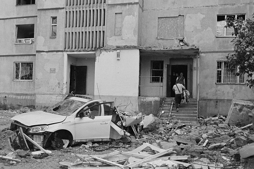 Residents from Saltivka, a residential area in Kharkiv, retrieving their belongings. For weeks missiles, rockets, and shells struck this residential area and caused significant damages to the buildings. In this same spot a woman was killed by debris from a rocket.