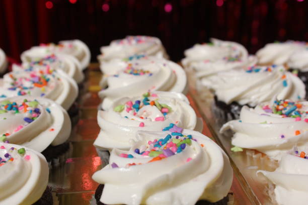 Cupcakes with Sprinkles on Table at Birthday Party Event
