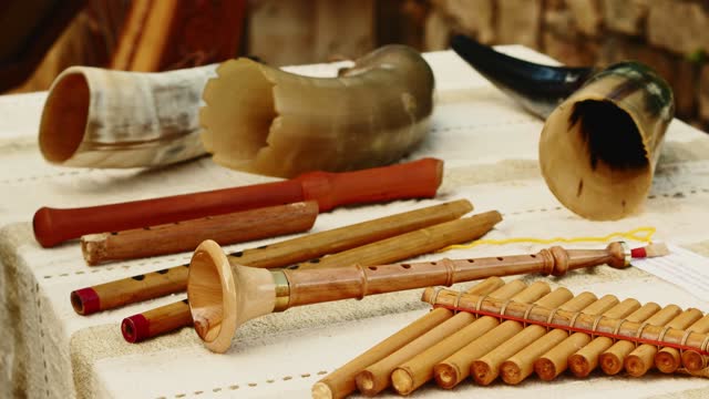close-up shot pan flute and other types of wooden flutes