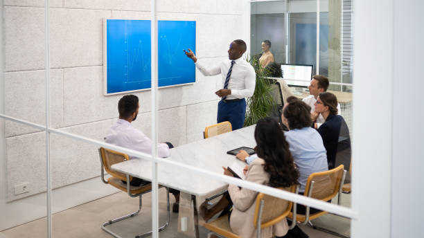 istock Businessman giving presentation with graph 1479986845