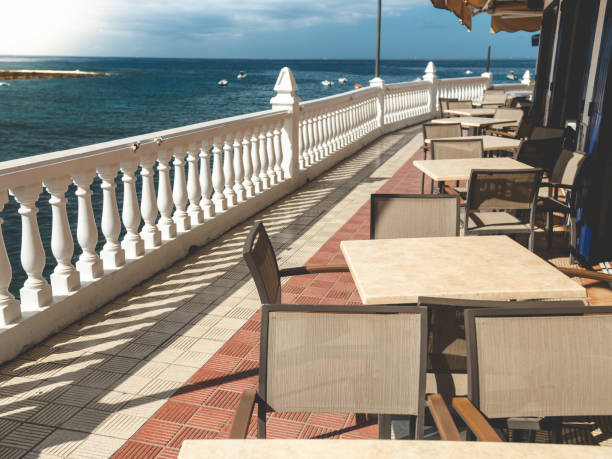 istock Toned image of empty cafe on the seafront at ocean beach 1479987453