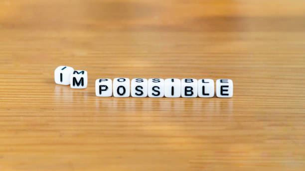 istock I’m possible impossible word in white block bead letters 1479989904