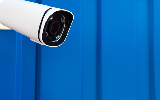 istock CCTV surveillance camera in factory area to control security system area with torch light and copy space 1479991691