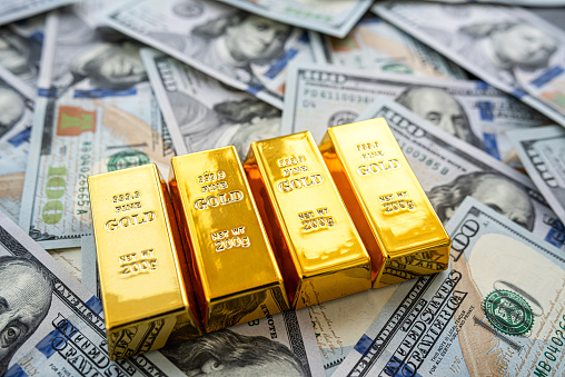 America US dollar with gold bars, finance saving concept, investment