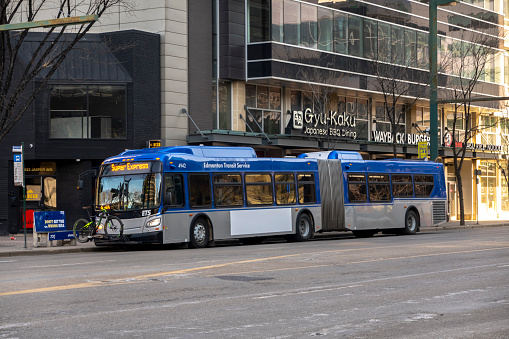 Edmonton, Alberta, Canada. Apr 04, 2023. An Edmonton Transit Service double bus in downtown Edmonton.