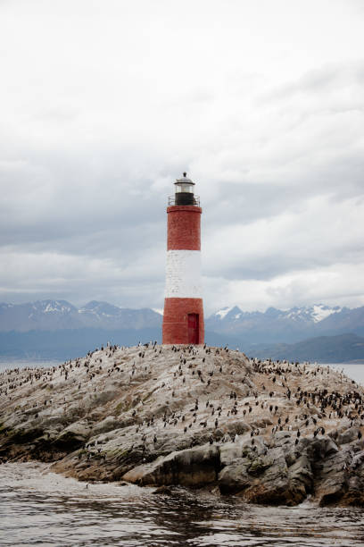 lighthouse at the end of the world - ushuaia faro del fin del mundo en ushuaia beagle channel stock pictures, royalty-free photos & images