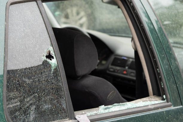 istock Criminal incident. Car hack. Broken right side window of car. 1479997065