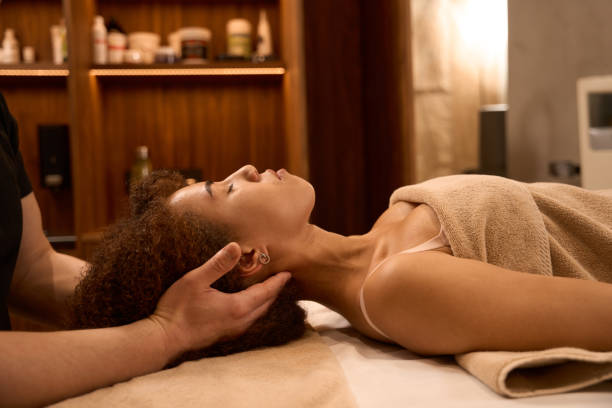 istock Young woman client lying on the massage desk in spa 1479997313