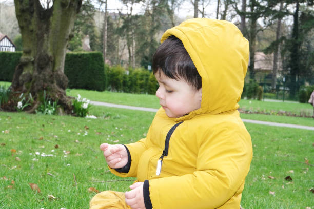 istock Cute Asian Pakistani Baby is Playing and Posing at Park 1479997662
