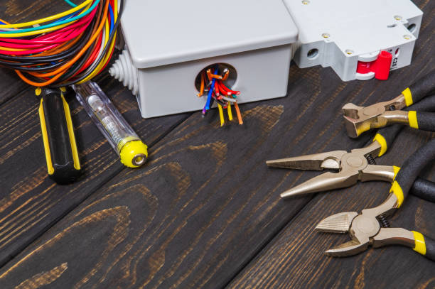 istock Electrical junction box with cables wire and tools used in the electric installation process 1479999080