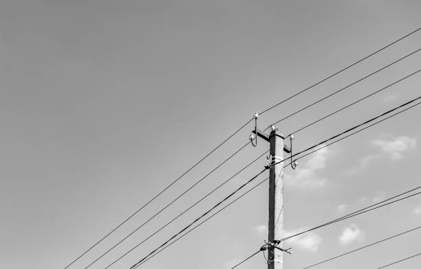 istock Power electric pole with line wire on light background close up 1479999274