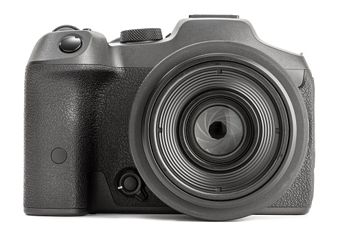 Front view of a Modern Photo camera with lens isolated on white background
