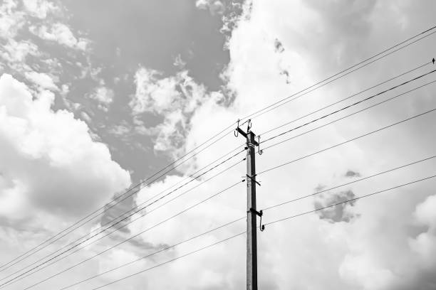 istock Power electric pole with line wire on light background close up 1479999410