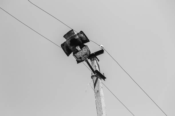 istock Power electric pole with line wire on light background close up 1479999418