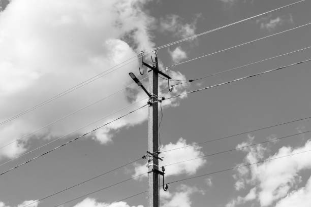 istock Power electric pole with line wire on light background close up 1480000158