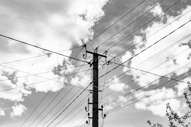 istock Power electric pole with line wire on light background close up 1480000261