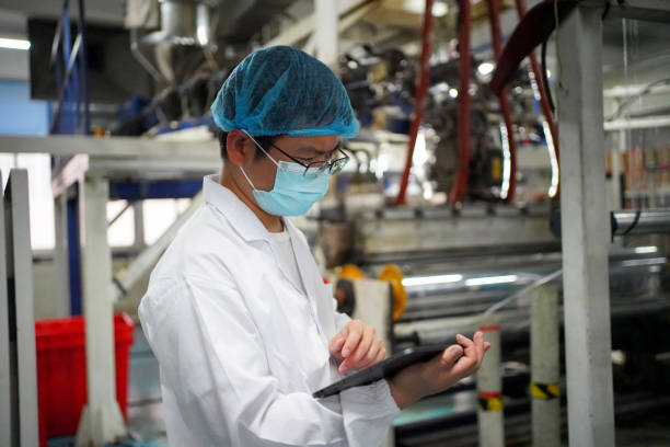 istock Check the production status of the factory using a tablet 1480000320