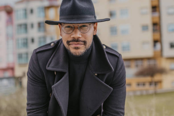 istock portrait of man in coat and hat 1480002243