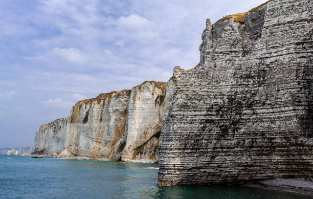 Rocky cliffs at Coastline north of to the bay of Étretat, Normandie, France stock photo