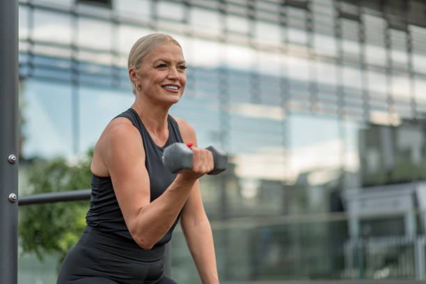 Mature woman work out stock photo