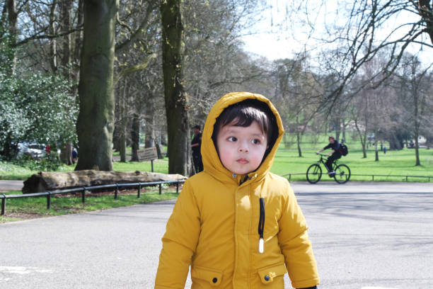 istock Cute Asian Pakistani Baby is Playing and Posing at Park 1480003354