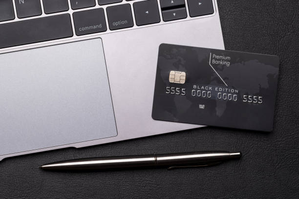 istock Black credit card on office table 1480004915