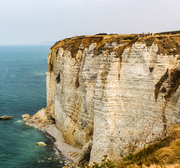 Rocky cliffs at Coastline north of to the bay of Étretat, Normandie, France stock photo