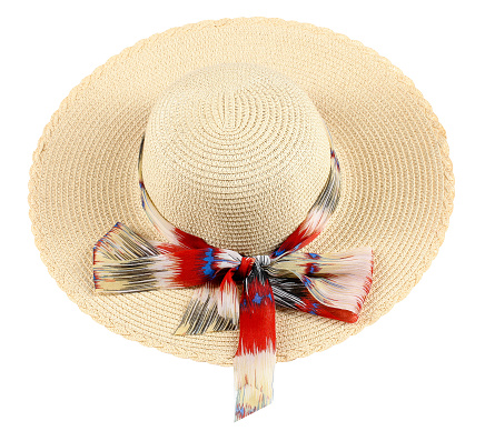 Feminine straw hat with colorful ribbon, isolated on white background, cut out, clipping path, studio shot