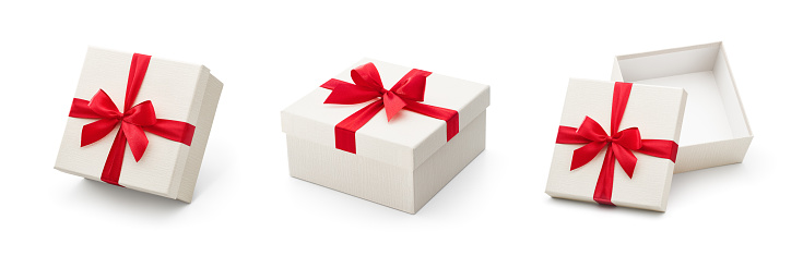 Set of gift boxes with colorful ribbons on white. This file is cleaned and retouched.