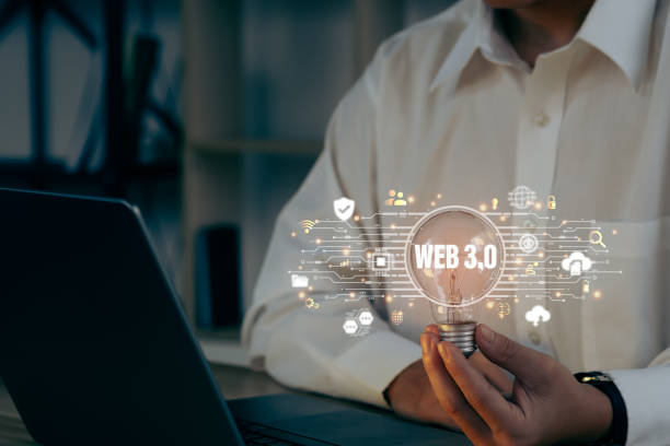 istock Businessman holding light bulb with icon Web 3.0. Technology and WEB 3.0 concept. 1480016285