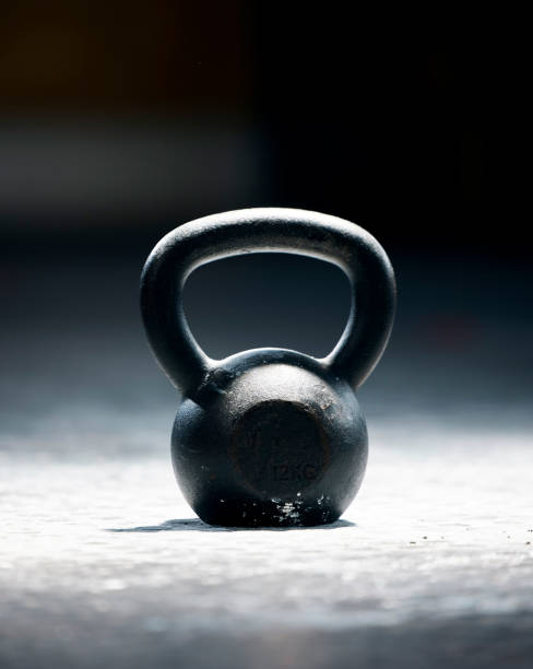 istock Fitness, motivation or kettlebell at a gym with mockup space for strength training, exercise or workout. Zoom, metal equipment or heavy weight for strong muscle development or growth in health club 1480017588