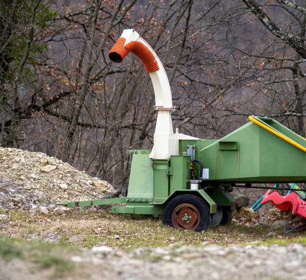 istock detail of a chipper machine in a meadow 1480023020