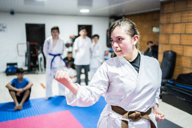 istock Teenage girl training during a karate class 1480023693