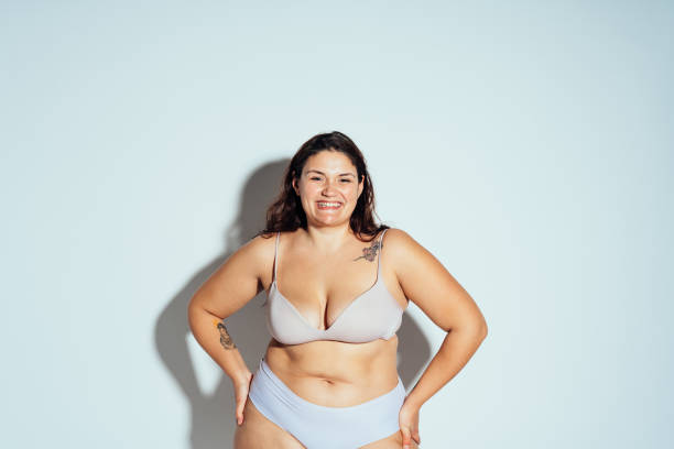 istock Plus size woman posing in studio in lingerie 1480024960