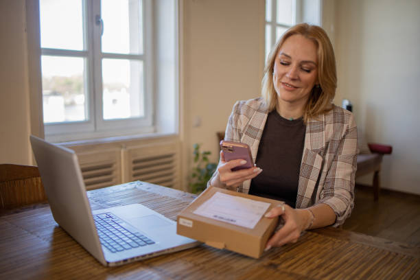 istock Entrepreneur is sending a package to a customer 1480025923