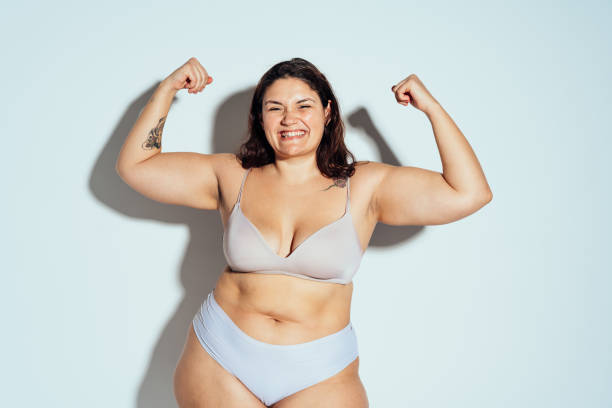 istock Plus size woman posing in studio in lingerie 1480026076