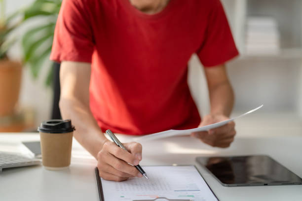 istock Male writes information businessman working on laptop computer writing business plan while sitting in office. 1480028114