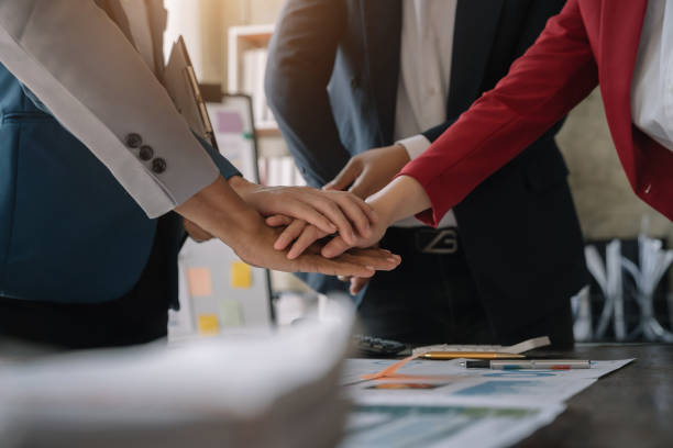 istock Business team shake hands confidently professional investor working with new startup project at an office meeting. 1480028116
