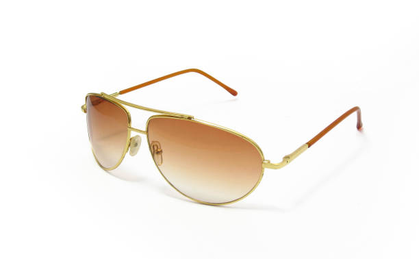 istock side view of golden glasses isolated 1480031151