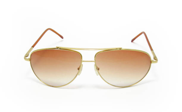 istock front view of golden glasses isolated 1480031161