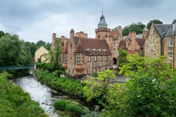 Photo of Dean village cityscape and Water of Leith river in Edinburgh Scotland