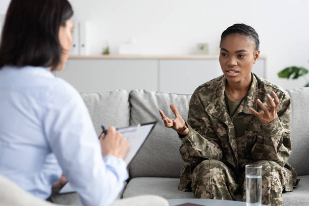istock Black Young Military Lady Explaining Her Problems To Female Psychotherapist 1480034964