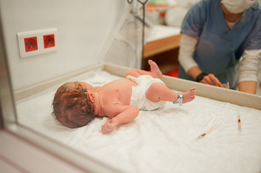 Newborn baby vaccination. Concept photo child healthcare. copyspace
