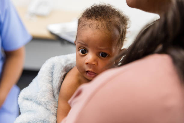 istock Close up of newborn boy looking at the camera 1480040730