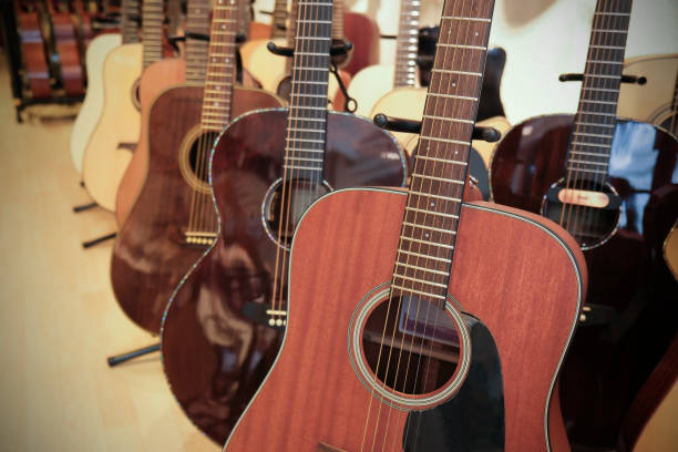 istock Many acoustic guitars are in a store 1480050661