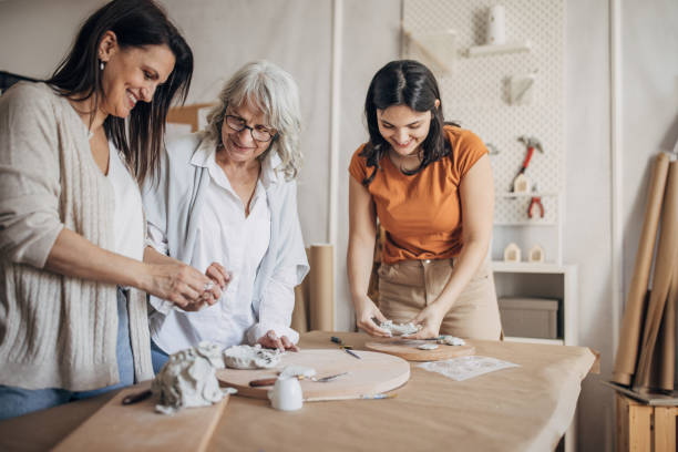 istock Women learning clay art together 1480050961