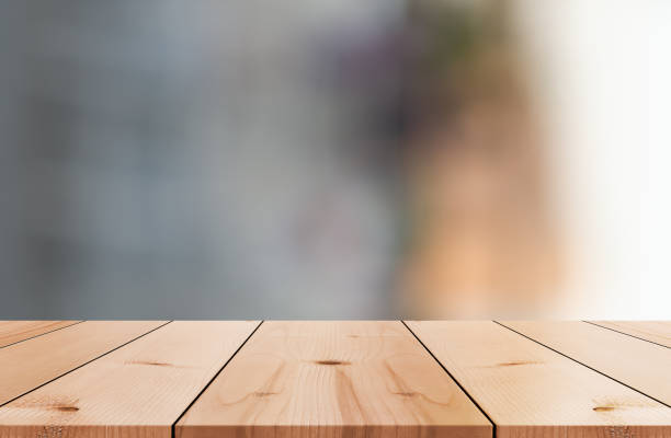 istock Empty wooden table top with lights bokeh on blur restaurant background. 1480061479