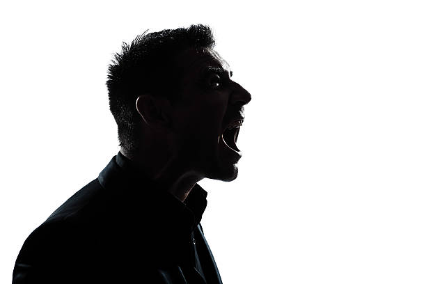 istock silhouette man portrait profile screaming angry 148006148