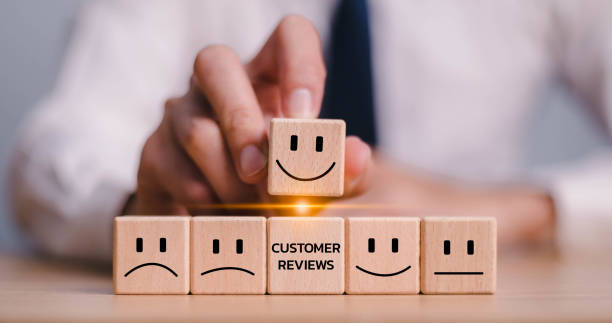 istock customer services best excellent business rating experience. Satisfaction survey concept. Hand of a businessman chooses a smile face on wood block circle. 5 Star Satisfaction. 1480061505